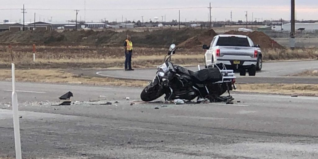 Motorcycle Laying in Highway After Crash