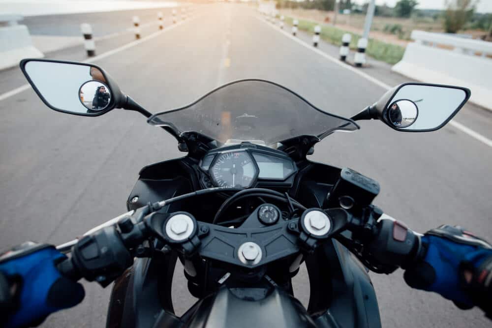 Motorcycle Riding in the Middle of the Street